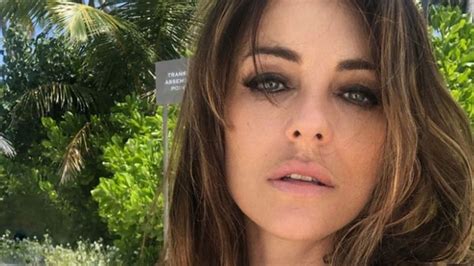 Elizabeth Hurley Shares Neon Bikini Photos from a Sauna